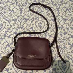 Marc Jacob’s burgundy rider crossbody bag